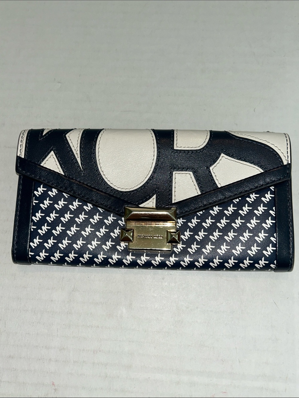 Michael Kors Whitney large graphic logo wallet  blue white & leather envelope